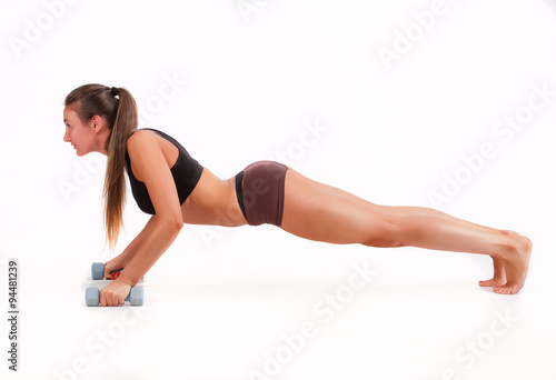 fitness woman doing exercises with dumbbell