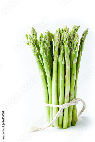 Bundle of asparagus on the white background vertical
