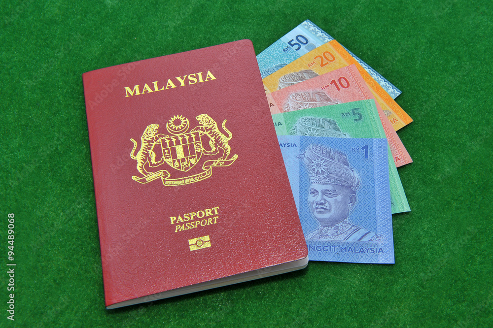 Malaysia bank notes and Malaysia Passport Stock Photo Adobe Stock