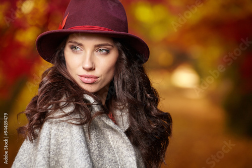 Beautiful woman in autumn park © ZoomTeam