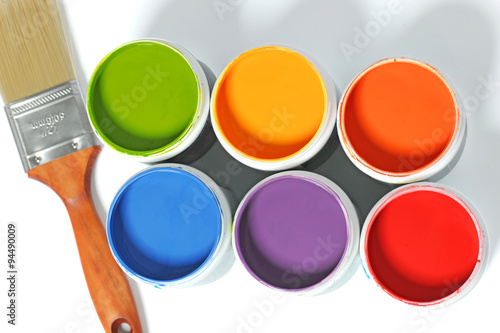 Cans of Paint with Paintbrush