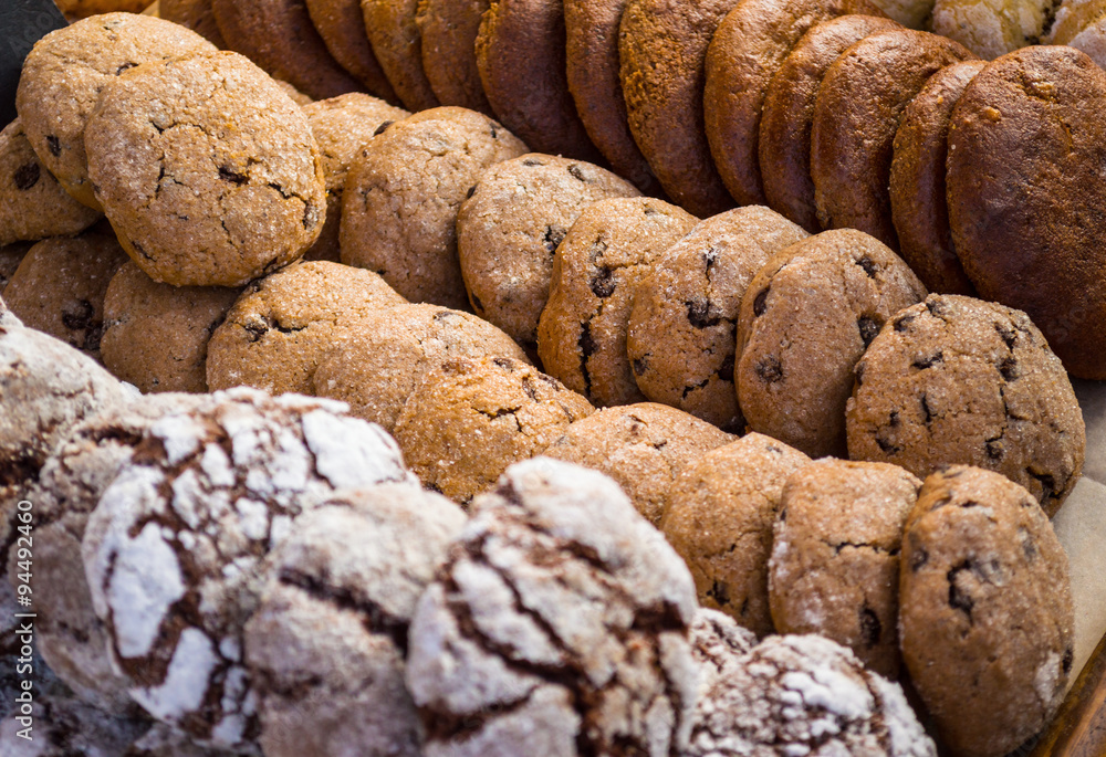 Different types of biscuits. With chocolate, oat, raisins and ginger