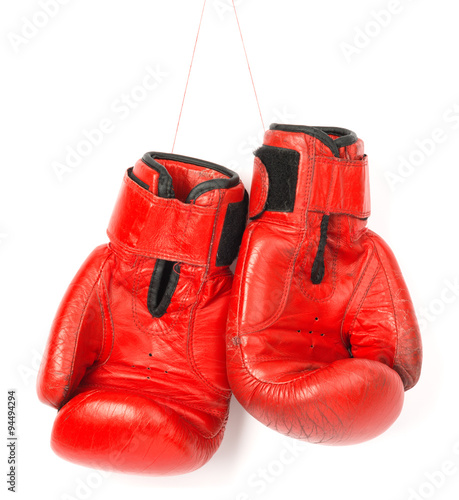 Red boxing gloves on white background © cherezoff