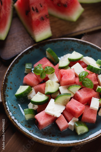 Salad with fresh watermelon, cucumber and bryndza cheese