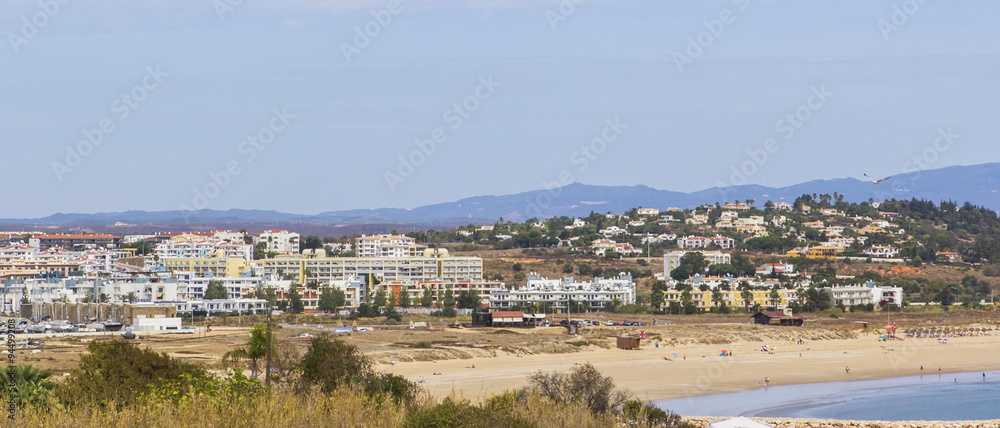 background landscape panoramic views of Lagos, the mountains and the city beach in the Algarve, southern Portugal
