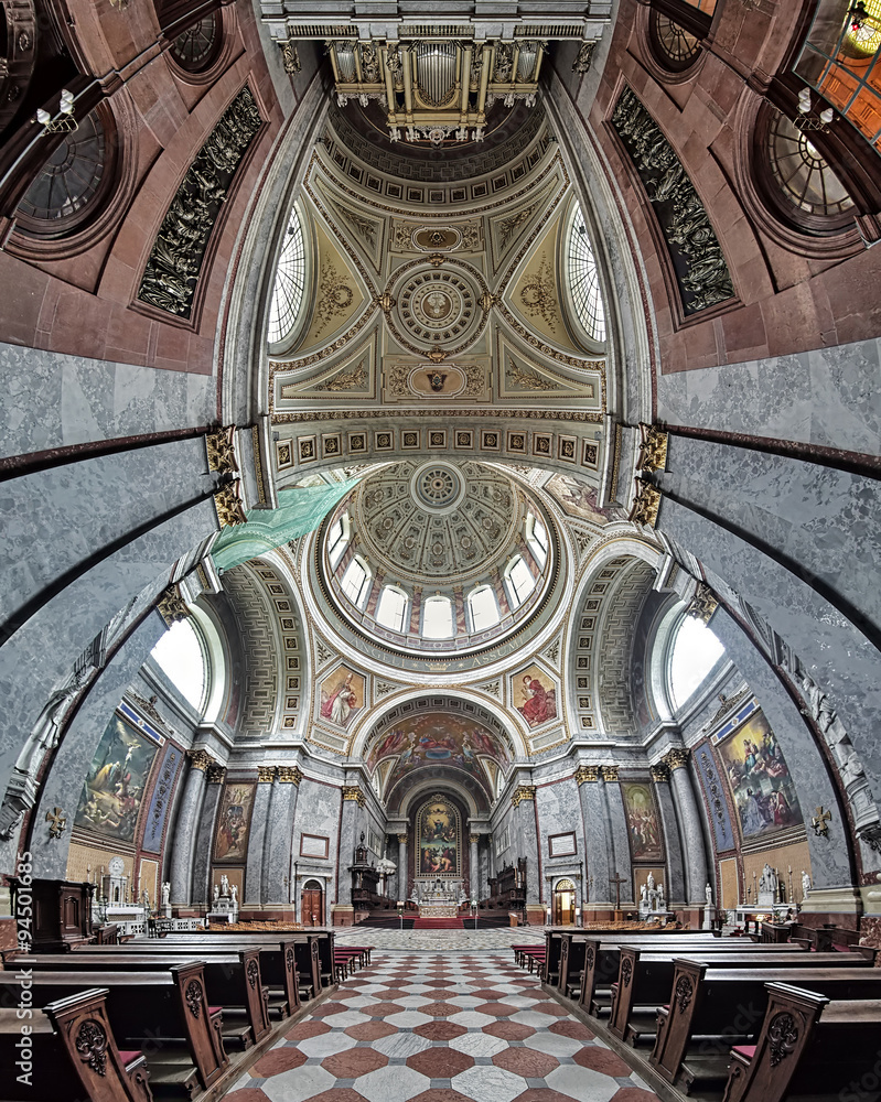 Obraz premium Vertical panorama of the interior of Esztergom Basilica. The Primatial Basilica of the Blessed Virgin Mary Assumed Into Heaven and St Adalbert is the biggest building in Hungary.