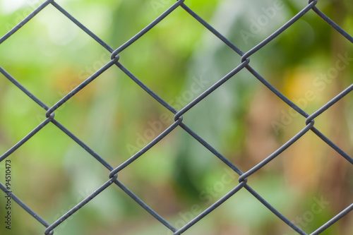 Obraz na płótnie Metallic mesh fence closeup background texture w salonie