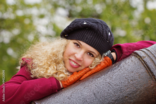 Portrait of the curly blond girl photo