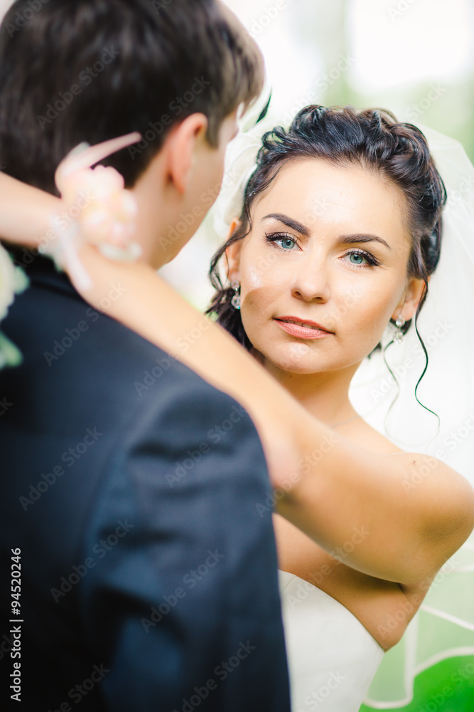 Obraz premium beautiful young couple stand on background forest
