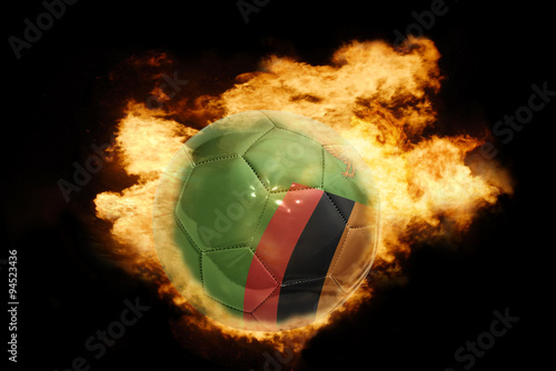 football ball with the flag of zambia on fire