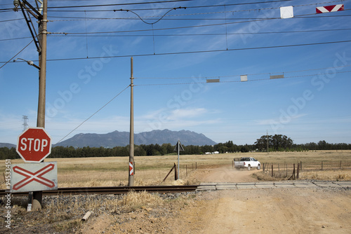 Fotografie Single railroad line passing througha farm in the wheatlands of the Swartland re