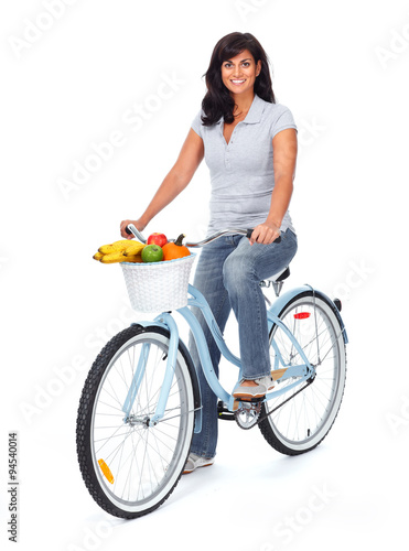 Young asian woman with bicycle.