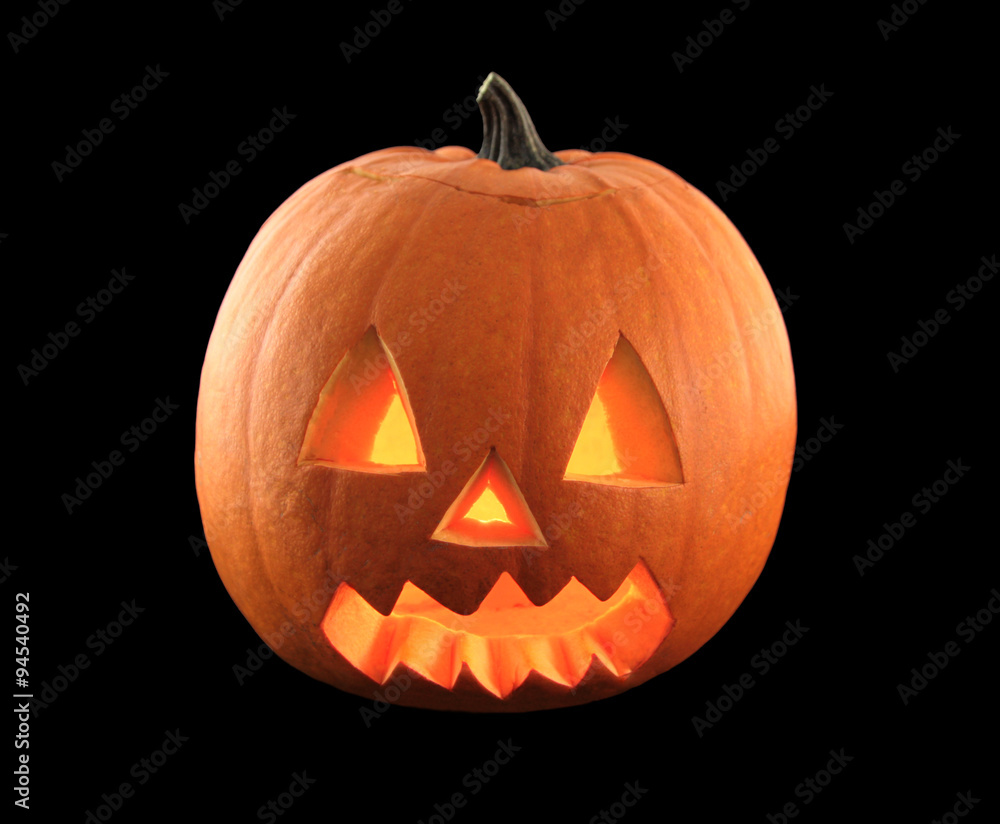 Halloween pumpkin with scary face isolated on black background.
Halloween pumpkin with scary face isolated on black background.