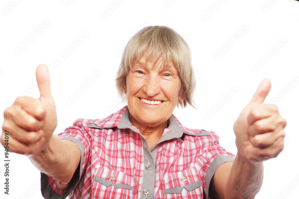 Old woman showing ok sign on a white background Old woman showing ok sign on a white background