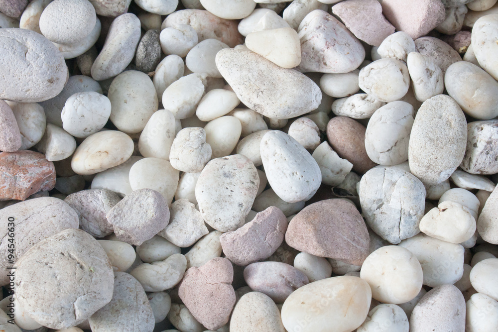 An abstract background with dry round reeble stones An abstract background with dry round reeble stones