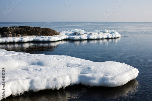 In sea ice, blocks of ice on the sea, the winter sea and the ocean, Arctic, aquatic nature, the ice floe in the ocean, melting ice, spring in the North sea, the Arctic in the spring, wildlife