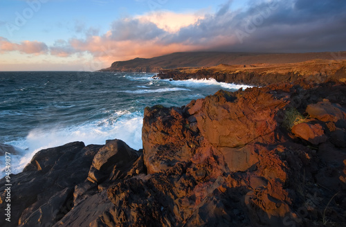 Lava field on the coast of the island of Iturup. Yankito plateau. photo