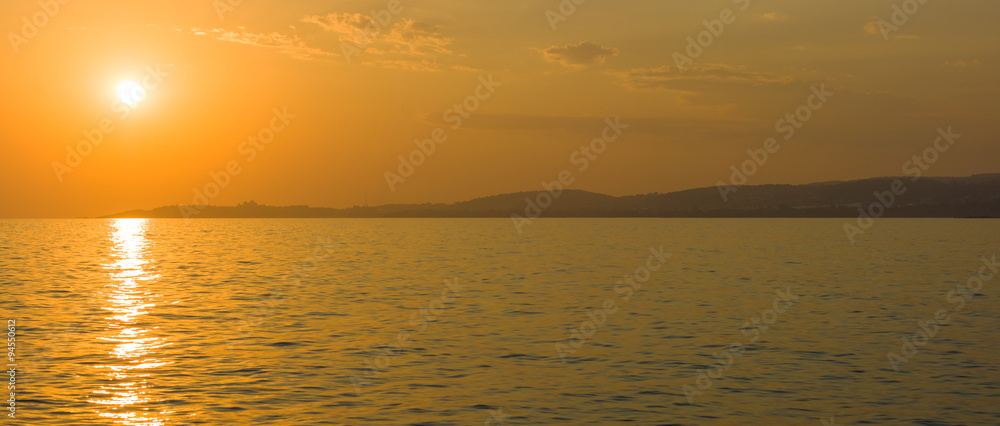 Sunset on the sea. Panoramic view.