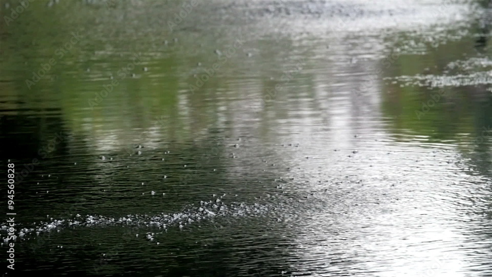A spring lake with waters bubbling. Like there is a boiling of water underneath A spring lake with waters bubbling. Like there is a boiling of water underneath