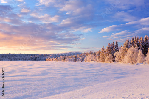 Frozen   ij  j  rvi lake in Finnish Lapland in winter at sunset