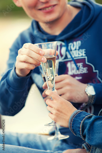 engagement ring in a glass of champagne