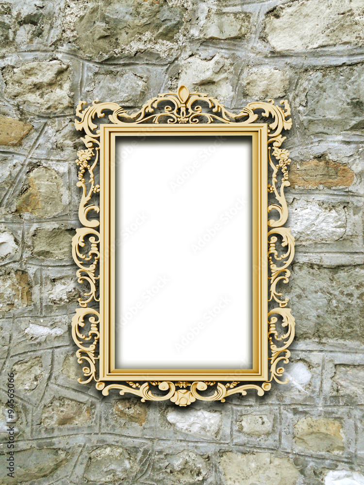 One golden baroque frame on medieval stone wall background One golden baroque frame on medieval stone wall background