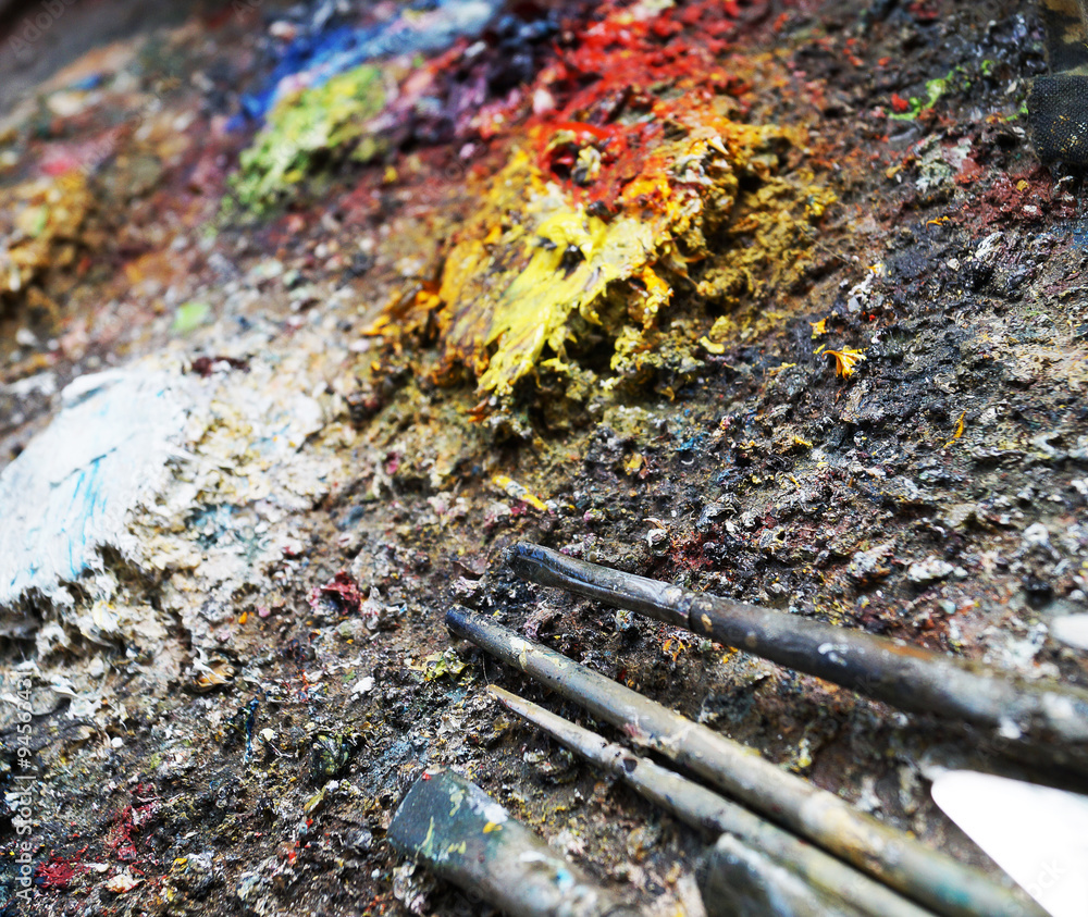 paints on an easel paints on an easel