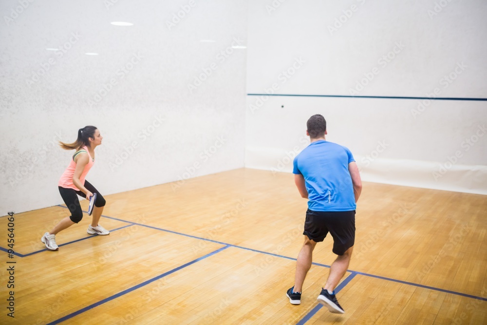 Couple enjoying a game of squash