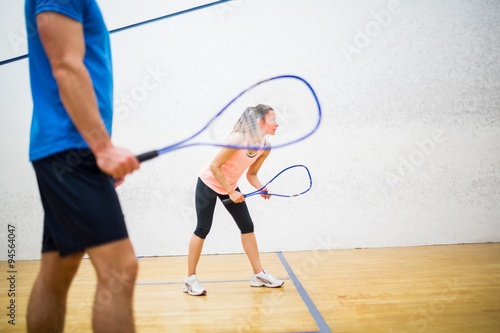 Woman about to serve the ball