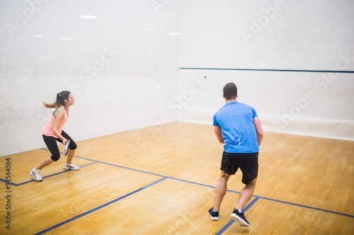 Couple enjoying a game of squash