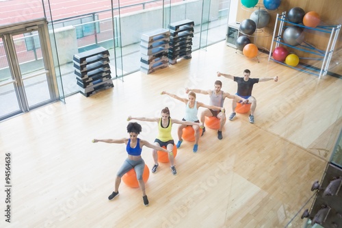 Fitness class exercising in the studio