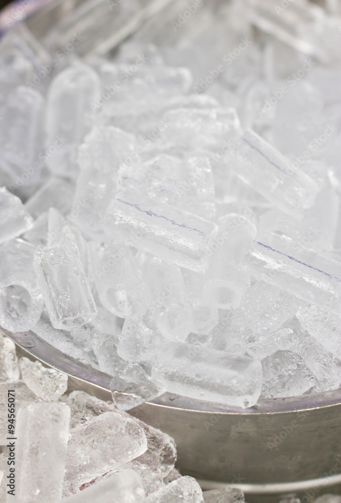 Ice in metallic bowl. Ice in metallic bowl.