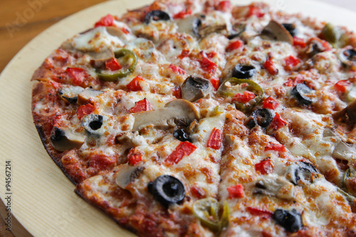 Closeup of a vegetarian flat bread thin crust pizza