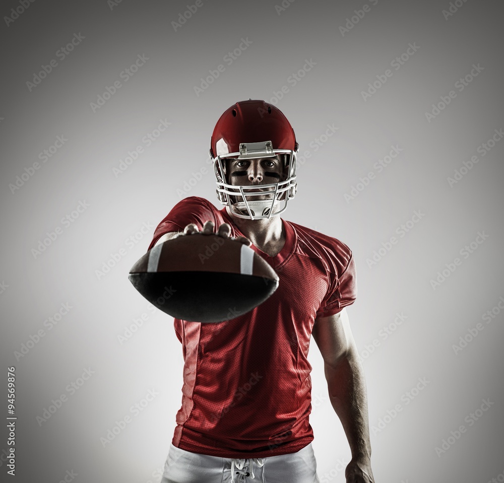 Composite image of american football player showing ball