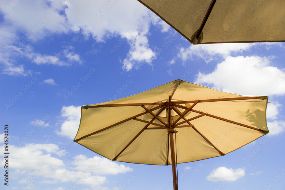 big umbrella with the sky scene in beautiful day