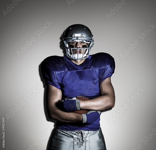 Portrait of confident american football player