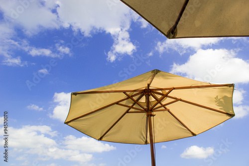 big umbrella with the sky scene in beautiful day