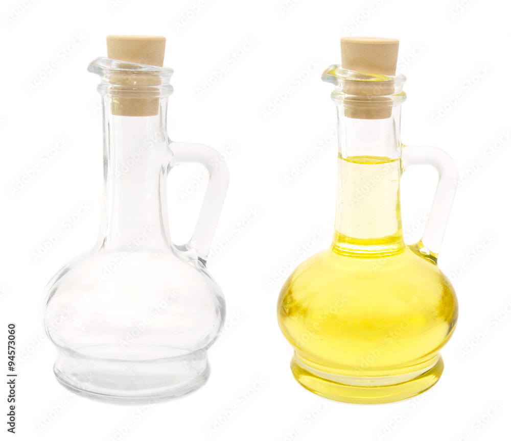 Oil in glass bottle and empty bottle Oil in glass bottle and empty bottle