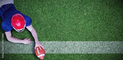 Quadro em tela Composite image of american football player scoring a touchdown