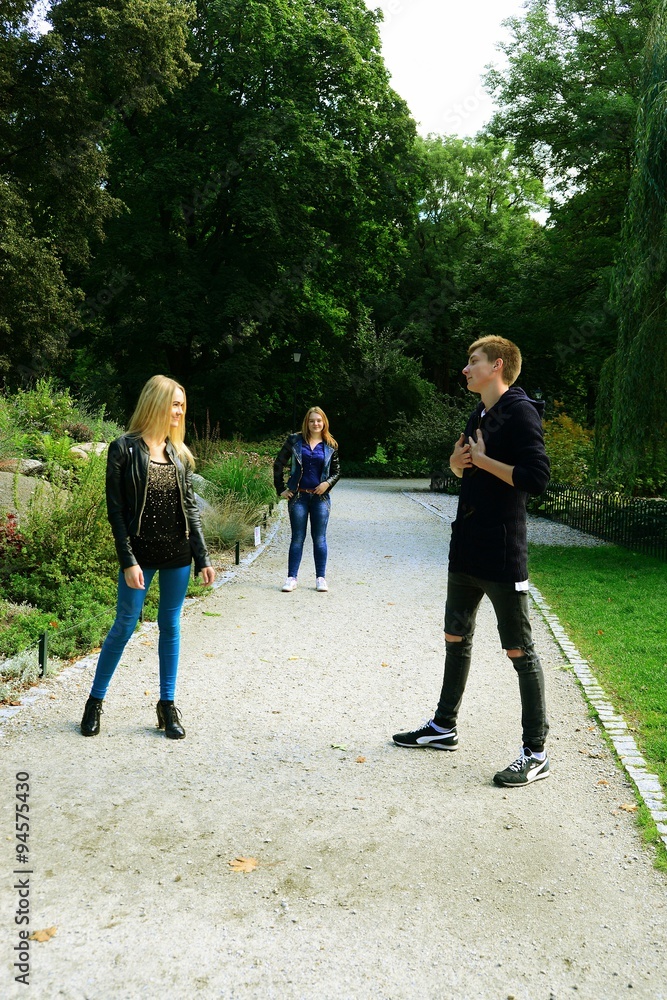 Love triangle in Vilnius town Bernardinu garden on autumn