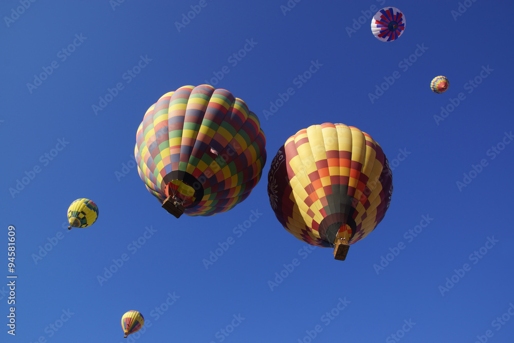 Balloons fill the air over wine vineyard during 2015 Temecula Balloon Festival in California Balloons fill the air over wine vineyard during 2015 Temecula Balloon Festival in California