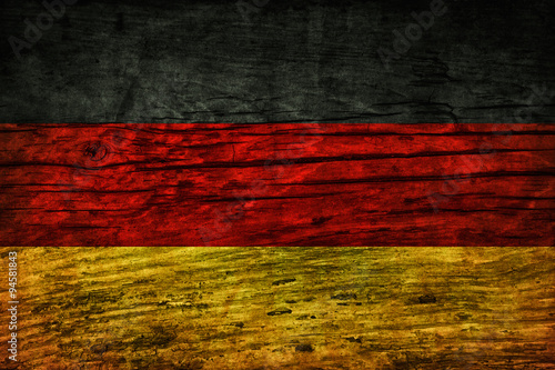 Vintage flag of Germany on a wooden surface
