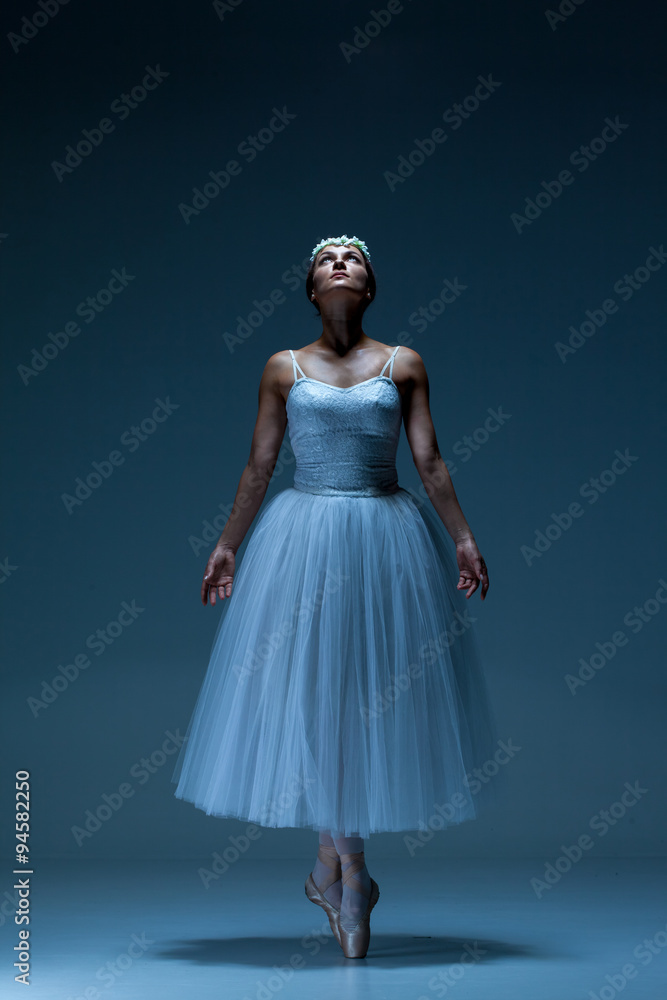 Portrait of the ballerina on blue background Portrait of the ballerina on blue background