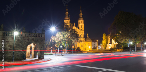 dom and traffic lights in fulda germany at night photo