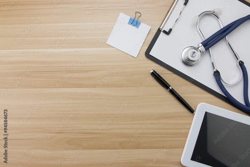 Stethoscope in doctors desk Stethoscope in doctors desk