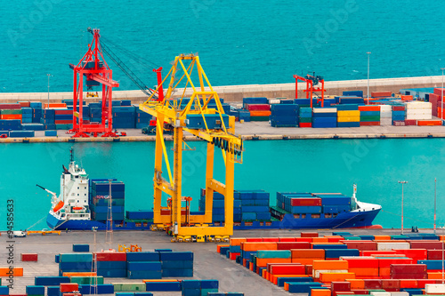Loading containers on a sea cargo ship, Barcelona