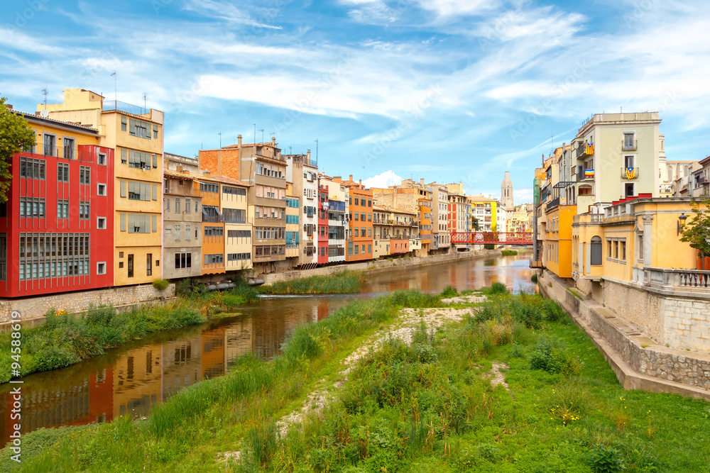 Girona. Multi-colored facades of houses on the river Onyar.