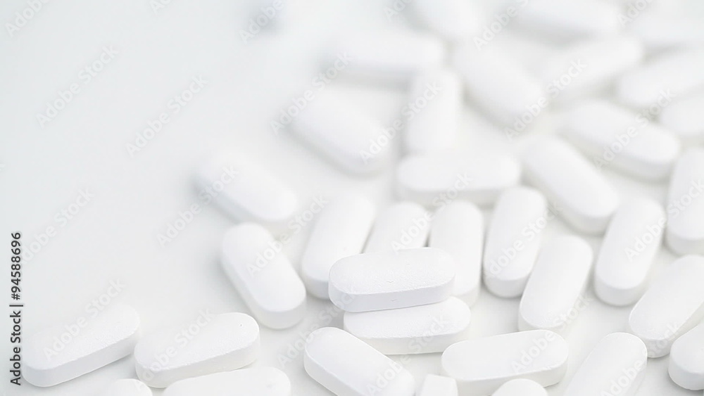 Pills on table with copy space on the left