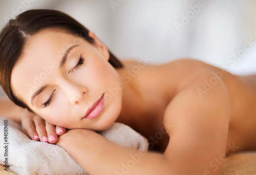 beautiful woman with closed eyes in spa