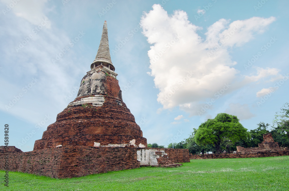 Old buddha pagoda temple with cloudy white sky in Ayuthaya Thailand